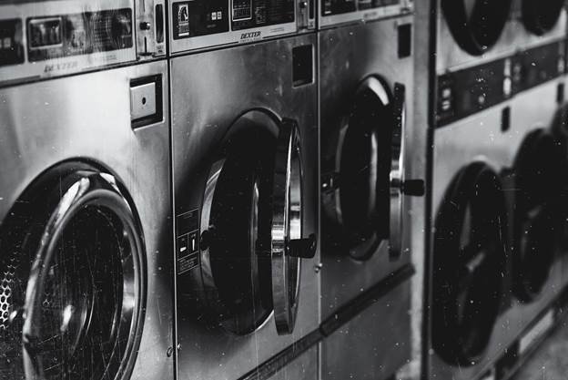 Electrolux coin laundry equipment.